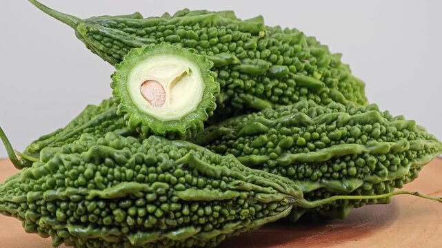 Bitter Melon or Bitter Gourd on Wooden Board.