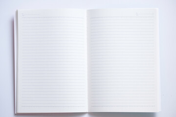 Close-up of blank notebook isolated on white background