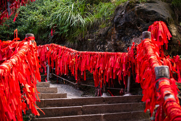 Red ribbons or strings used as blessing in buddhism