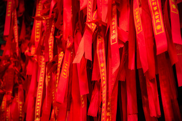 Red ribbons or strings used as blessing in buddhism