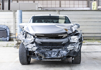 pickup car front view get damaged by accident on the road. damaged cars after collision.