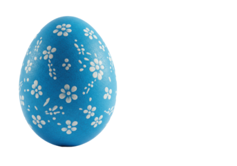 Deep blue Easter egg, hand-decorated with white floral patterns and delicate dots, pearlescent sheen, on a transparent background with soft shadow and copy space, elegant Easter celebration