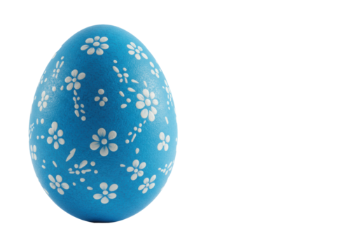 Deep blue Easter egg, hand-decorated with white floral patterns and delicate dots, pearlescent sheen, on a transparent background with soft shadow and copy space, elegant Easter celebration