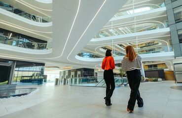 Modern accounting firm lobby with people walking inside