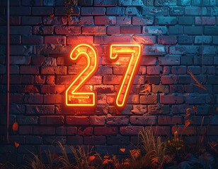 Neon numbers 27 on a brick wall at night