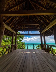 Wooden hut overlooking turquoise ocean