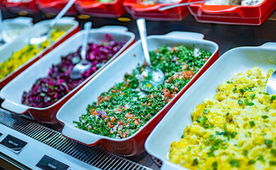 Levantine vegetable salads displayed in a restaurant