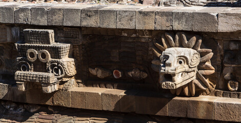 Teotihuacan, Mexico - 1 December 2022: Decorations and stone carvings of pyramids of Teotihuacan 