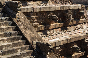 Teotihuacan, Mexico - 1 December 2022: Decorations and stone carvings of pyramids of Teotihuacan 