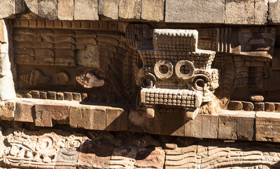Teotihuacan, Mexico - 1 December 2022: Decorations and stone carvings of pyramids of Teotihuacan 