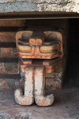 Teotihuacan, Mexico - 1 December 2022: Detailed snake head is the representation of the god Quetzalcoatl at the temple of the Feathered Serpent