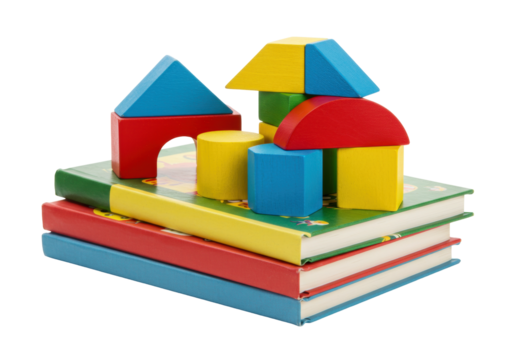 Isolated colorful building blocks on top of stacked books for educational purposes