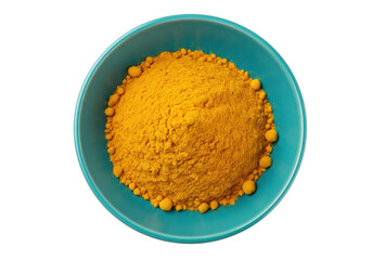 Isolated bright yellow turmeric powder in blue ceramic bowl viewed from above on seamless