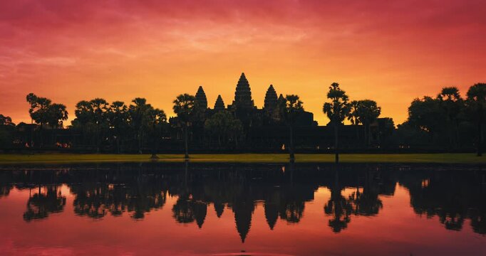 Angkor Wat Temple Sunrise Silhouette With Moving Water Reflection