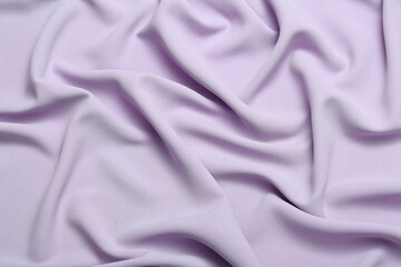 Soft lightweight flowy georgette fabric in lavender color, elegantly draped with natural folds. Perfect for fashion design, textiles, sewing, dressmaking, and delicate feminine style concepts.