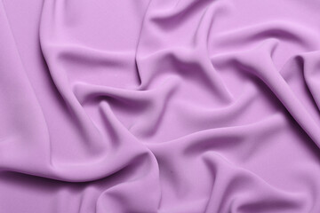 Soft lightweight flowy georgette fabric in lavender color, elegantly draped with natural folds. Perfect for fashion design, textiles, sewing, dressmaking, and delicate feminine style concepts.