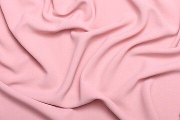 Soft lightweight flowy georgette fabric in pastel pink, elegantly draped with natural folds. Perfect for fashion design, textiles, sewing, dressmaking, and delicate feminine style concepts.
