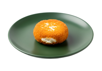 Crispy, golden-brown cheese ball sits on a rich, deep green plate against a stark black background.