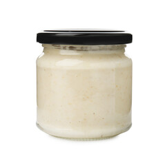 Tasty horseradish sauce in glass jar isolated on white