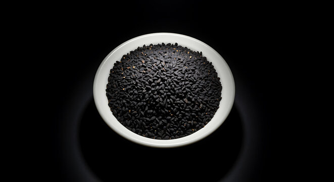 White bowl filled with black cumin seeds on black background 2