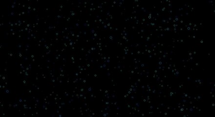 a dark background with numerous small, shimmering, multi-colored particles or circles, resembling a cosmic or abstract particle field. - Powered by Adobe