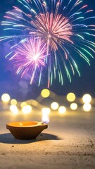 Fireworks over a diya on the beach at night