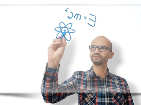Man studying chemistry - Powered by Adobe