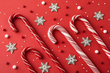 Candy Cane Christmas Joy: A delightful composition of festive red and white candy canes artfully arranged with sparkling snowflakes, exuding the warmth and cheer of the holiday season.