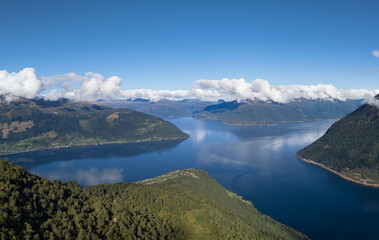 Naklejka premium Panorama of Hardangerfjord in Norway during sunny day, one of the biggest fjords in Norway