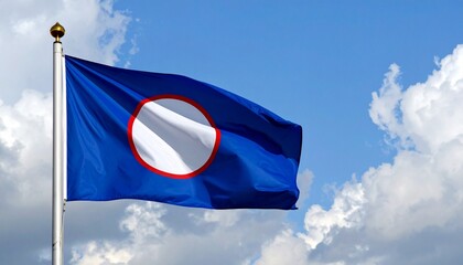 Kekistan flag flying on pole against cloudy sky, symbolizing internet culture and fictional identity.