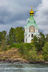 Elegant white church in the name of St. Nicholas of Myra . Valaam archipelago