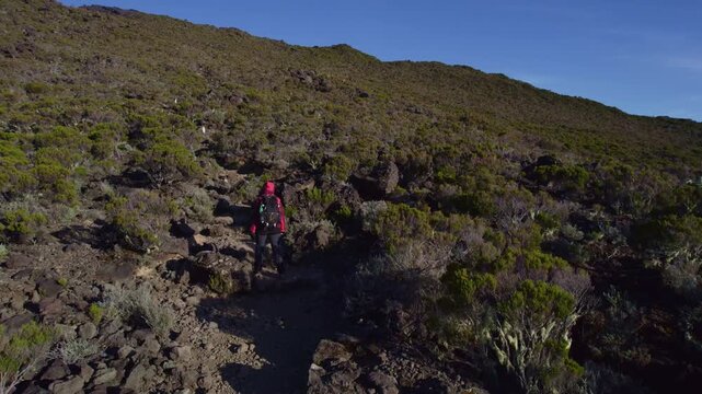 Drone Shot of Hikers Climbing Piton des Neiges Volcanic Summit in La R&eacute;union