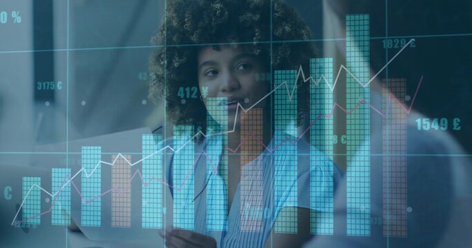 Curly-haired professional reviewing financial data overlays in modern office, with tablet