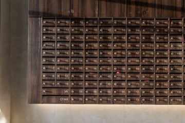 mailboxes in the lobby of an apartment building