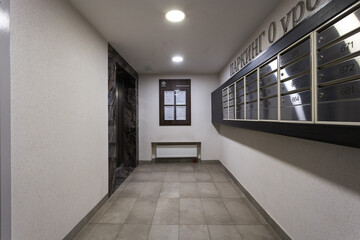 mailboxes in the lobby of an apartment building