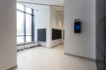 mailboxes in the lobby of an apartment building