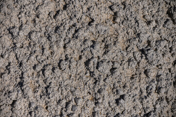 Textured stone wall as natural background