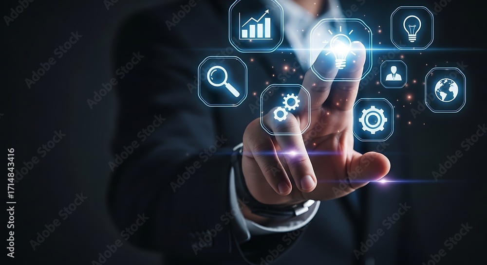 Poster man in suit touching glowing icons representing business concepts on a dark background technology