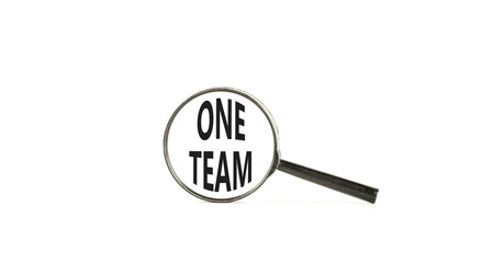 One team symbol. Concept word One team on beautiful magnifying glass. Beautiful white paper background. Black magnifying glass. Business one team concept. Copy space.