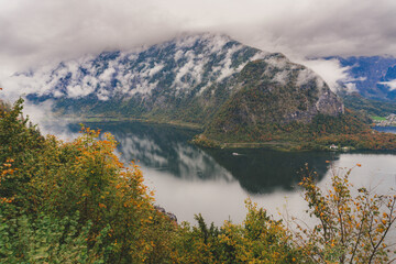 autumn landscape of a lake and alpine mountains