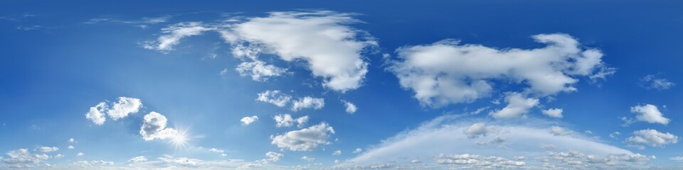 seamless cloudy blue sky with sun 360 hdri panorama with zenith and beautiful clouds for use in 3d graphics or game development as sky dome or edit drone shot