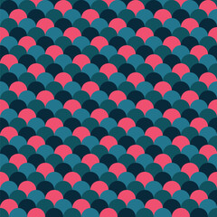 Pattern created from rows of overlapping blue and pink circles