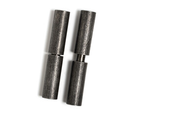 Pair of metal door hinges, an object on white.