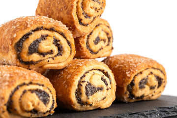 Rolls with poppy seeds on white background. closeup.