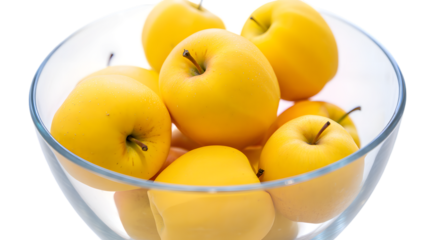 A clear glass bowl filled with bright yellow apples isolated on transparent background
