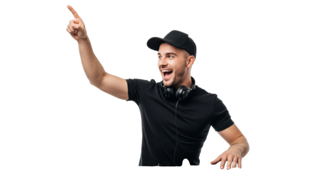 Young caucasian DJ in black t-shirt, cap, headphones, enthusiastically pointing behind spinning turntables on white studio, vibrant party atmosphere