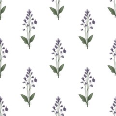 Seamless floral pattern with blue and purple wildflowers on a white background