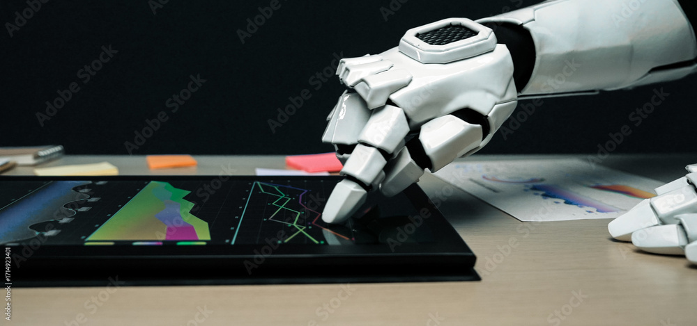 Poster a close-up of a robotic hand engaging with a touchscreen interface, displaying colorful graphs and d