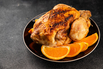 Baked chicken with oranges whole grilled chicken christmas holiday dish new year natural product tasty snack fresh delicious gourmet food background on the table rustic top view copy space