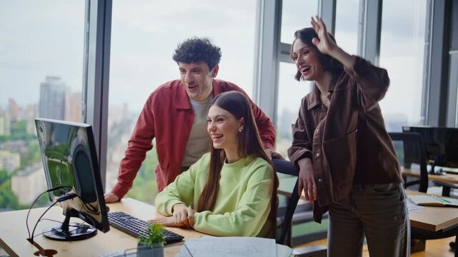Friendly coworkers greeting webcam laptop team video meeting in conference room